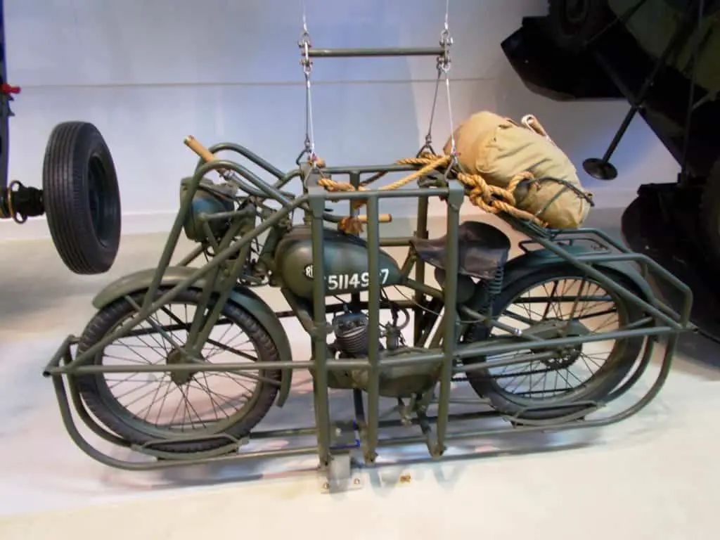 Royal Enfield 125 with attached Parachute and cage