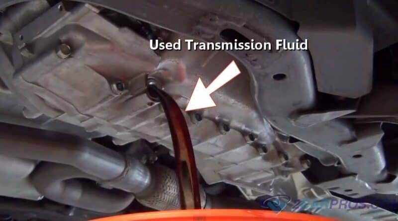 draining old transmission fluid